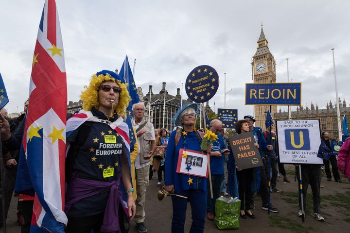 Pro-EU demonstrators take part in a rally on October 22, 2022. 