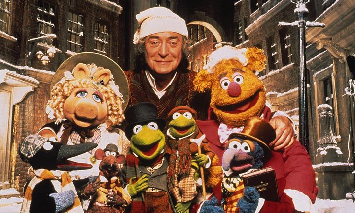 Michael Caine strikes a pose with The Muppets