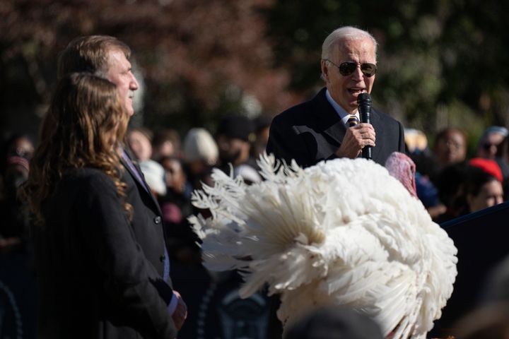 President Joe Biden pardons Chocolate, the national Thanksgiving turkey, at the White House in Washington, Monday, Nov. 21, 2022. Biden is joined by Ronald Parker, Chairman of the National Turkey Federation, and Alexa Starnes, daughter of the owner of Circle S Ranch. (AP Photo/Carolyn Kaster)