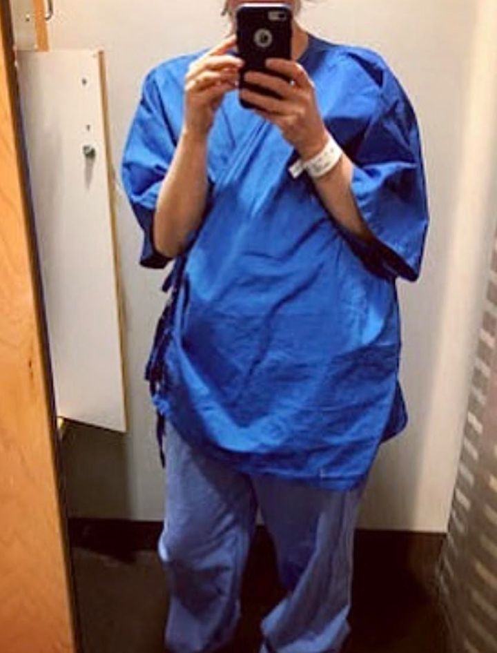 The author taking a selfie during her first mammogram appointment. "I didn't know at that time what was ahead of me," she writes.