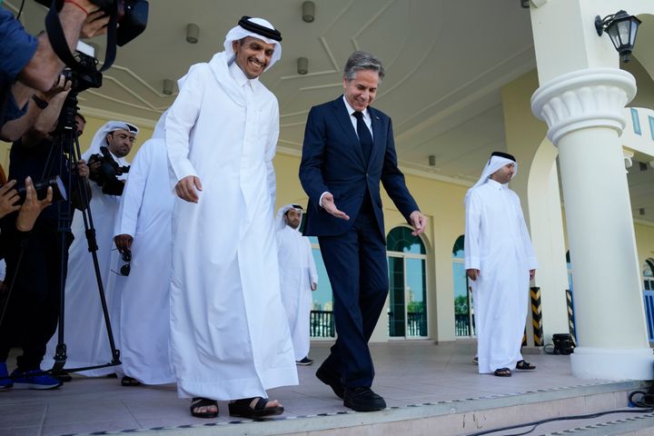 U.S. Secretary of State Antony Blinken, right, and Qatar Foreign Minister Mohammed Bin Adbulrahman Al Thani, left, walk to a media event at the Diplomatic Club, on Nov. 22, 2022.