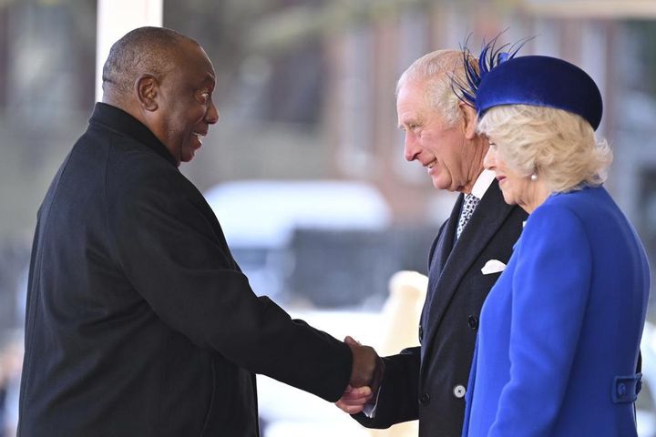 President of South Africa Cyril Ramaphosa shakes hands with Britain's King Charles III and Camilla, the Queen Consort, during the welcome ceremony at Horse Guards on Nov. 22.