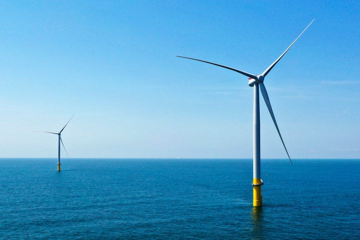 FILE - The two offshore wind turbines, constructed off the coast of Virginia Beach in 2020, are a pilot project for Dominion Energy's planned $9.8 billion Coastal Virginia Offshore Wind project.