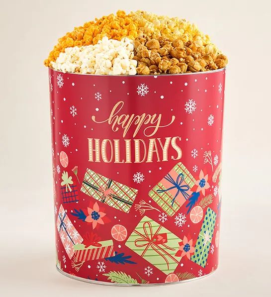 A holiday-themed tin filled with popcorn