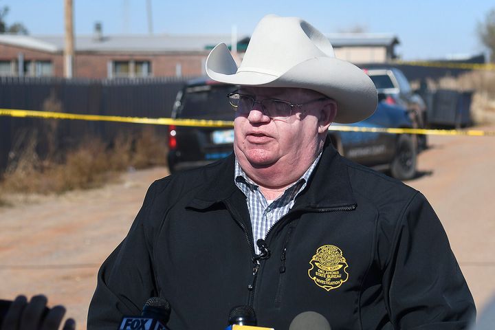 Capt. Stan Florence, Oklahoma Bureau of Investigation, gives a press briefing outside a residence near Lacey, Okla., in Kingfisher County, Monday, Nov. 21, 2022, the was the scene of a quadruple homicide. State police in Oklahoma say that four people killed at a marijuana farm were "executed," and that they were Chinese citizens. (Billy Hefton/The Enid News & Eagle via AP)