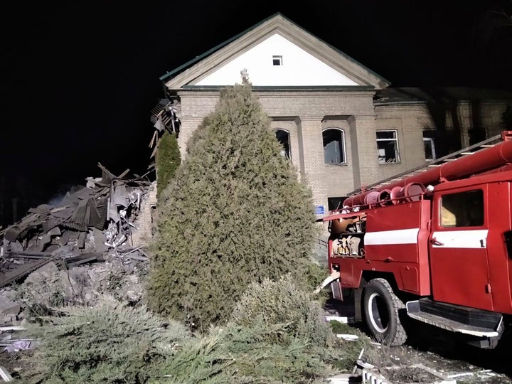 In this photo provided by the Zaporizhzhia region military administration, Ukrainian firefighters work at damaged hospital maternity ward in Vilniansk, Zaporizhzhia region, Ukraine, early Wednesday, Nov. 23, 2022. An overnight rocket attack struck a hospital maternity ward in southern Ukraine, killing a newborn baby, Ukrainian authorities said Wednesday. The baby's mother and a doctor were pulled alive from the rubble. The region's governor said the rockets were Russian.