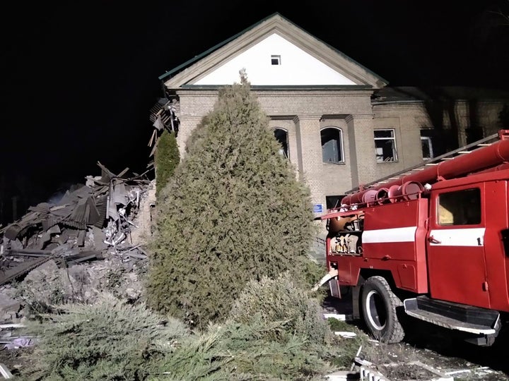 In this photo provided by the Zaporizhzhia region military administration, Ukrainian firefighters work at damaged hospital maternity ward in Vilniansk, Zaporizhzhia region, Ukraine, early Wednesday, Nov. 23, 2022. An overnight rocket attack struck a hospital maternity ward in southern Ukraine, killing a newborn baby, Ukrainian authorities said Wednesday. The baby's mother and a doctor were pulled alive from the rubble. The region's governor said the rockets were Russian. 