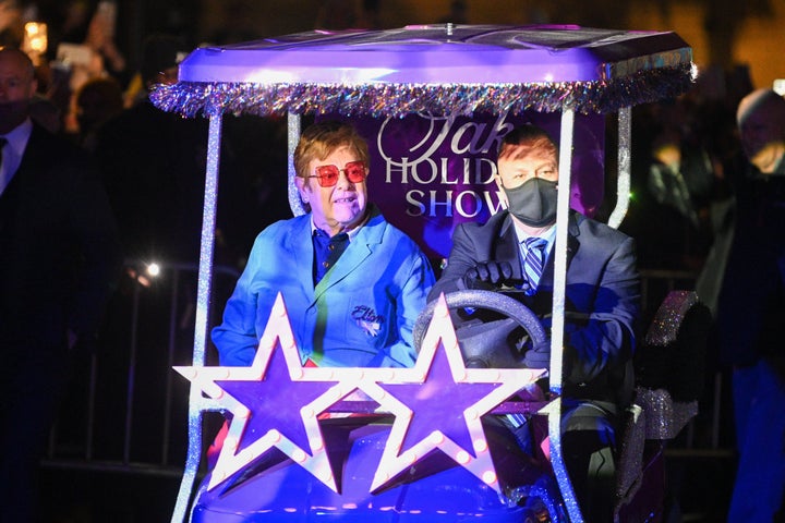 Sir Elton John kicks off holiday season at Saks Fifth Avenue window  unveiling and light show