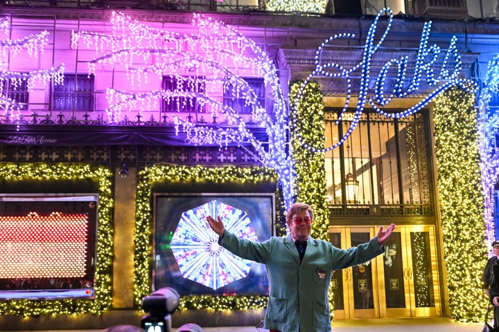 This year, Saks' holiday windows feature subtle tributes to John, who wrapped up what he said would be his final U.S. tour over the weekend.