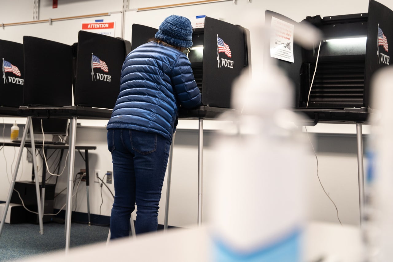 Despite his resignation, Greene still was on this year’s ballot. A voter fills out a ballot at a polling place on Nov. 8 in Winston-Salem, North Carolina.