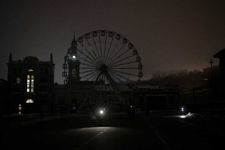 A view of Podil district during a blackout after a Russian rocket attack in Kyiv, Ukraine, on Nov. 23, 2022. Russia unleashed a new missile onslaught on Ukraine's battered energy grid Wednesday, robbing cities of power and some of water and public transport, too, compounding the hardship of winter for millions. The aerial mauling of power supplies also took nuclear plants and internet links offline and spilled blackouts into neighbor Moldova. 