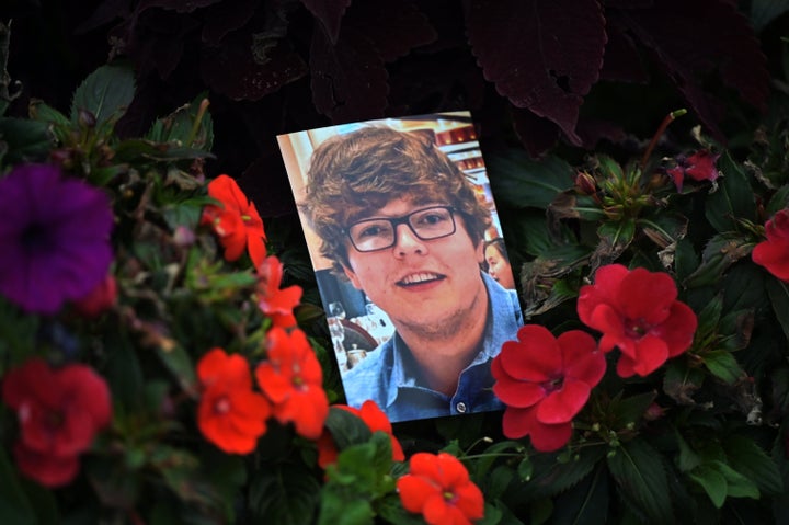 Photo of Christian Glass placed for candle vigil at Citizens Park in Idaho Springs, Colorado on Sept. 20, 2022. A Clear Creek County deputy shot and killed 22-year-old Christian Glass on June 11 after Glass called 911 for help after crashing his car into a berm.