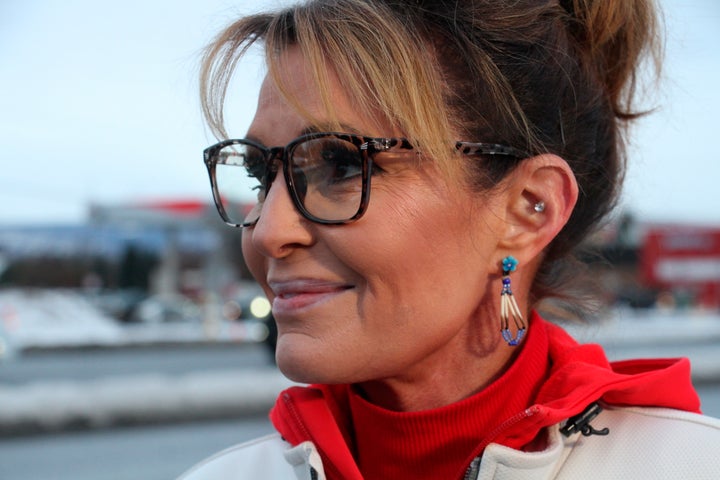 Former Alaska Gov. Sarah Palin, a Republican candidate for Alaska's sole seat in the U.S. House, meets with reporters during a sign-waving event on Nov. 8, 2022, in Anchorage, Alaska. Palin faced U.S. Rep. Mary Peltola, a Democrat, Republican Nick Begich and Libertarian Chris Bye in the general election.