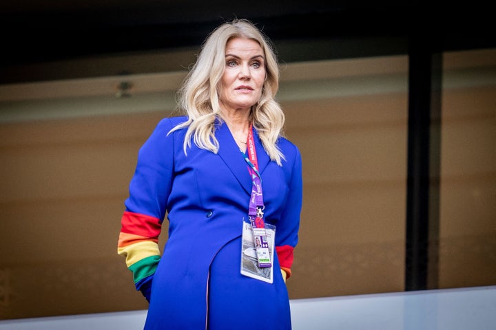 Former Danish Prime Minister Helle Thorning-Schmidt with rainbow-colored sleeves during Denmark's game against Tunisia.