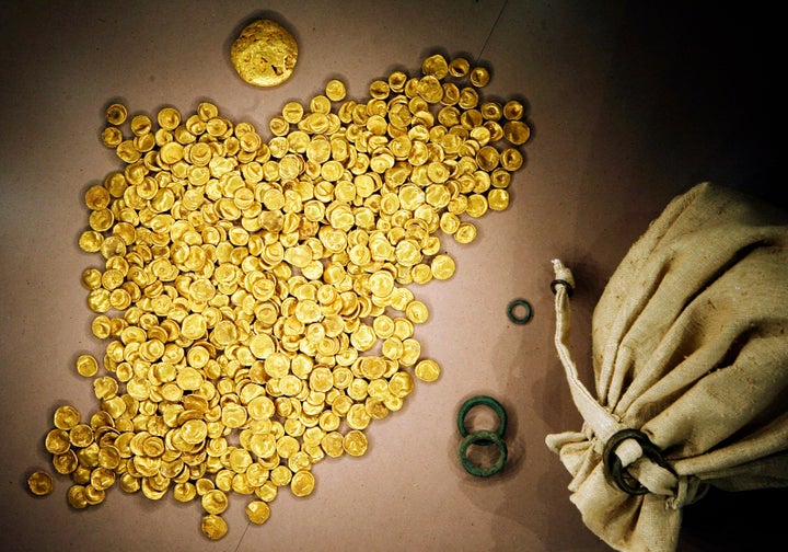 A senior official said organized crime groups were likely behind the theft of a huge horde of ancient gold coins.