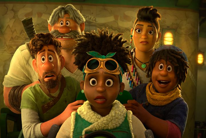 This image released by Disney shows, clockwise from foreground center Meridian Clade, voiced by Gabrielle Union Searcher Clade, voiced by Jake Gyllenhaal, Jaeger Clade, voiced by Dennis Quaid, Callisto Mal, voiced by Lucy Liu, Ethan Clade, voiced by Jaboukie Young-White in a scene from the animated film "Strange World." (Disney via AP)