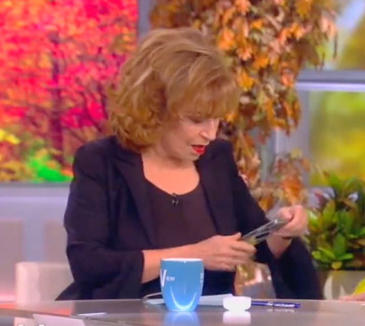 Joy Behar struggles to turn off her smartphone during the opening minutes of "The View" on Monday.