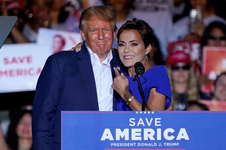 Then-Arizona Republican Gubernatorial candidate Kari Lake embraces former President Donald Trump during a rally in Mesa, Arizona, in October.