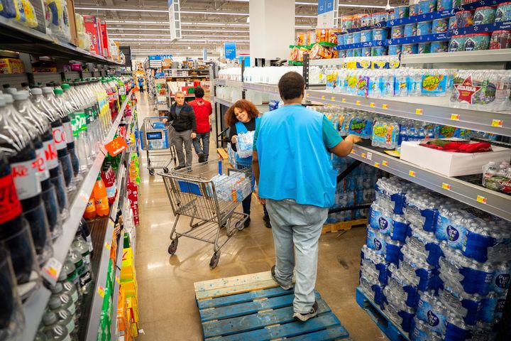 People shop for bottled water after a boil water notice was issued for the entire city of Houston on Sunday.