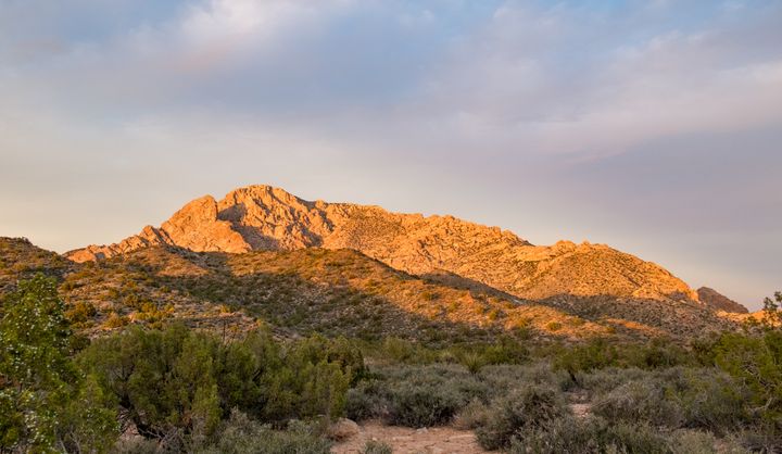 Spirit Mountain, pictured here at sunset, is sacred to a dozen Native American tribes and rich in cultural, natural and historical resources. 