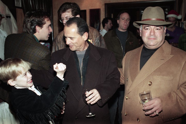 Macaulay Culkin (left) said Joe Pesci (center) bit his finger during rehearsals for the first "Home Alone" film.