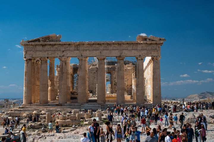 ATHENS, GREECE - 2022/10/08: Tourists visiting the Parthenon in the Acropolis of Athens. (Photo by Marcos del Mazo/LightRocket via Getty Images)