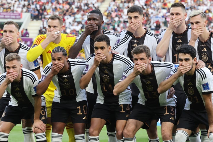 The starting 11 of the German national soccer team are photographed protesting FIFA's ban on captain Manuel Neuer wearing the rainbow "OneLove" armband in Qatar.