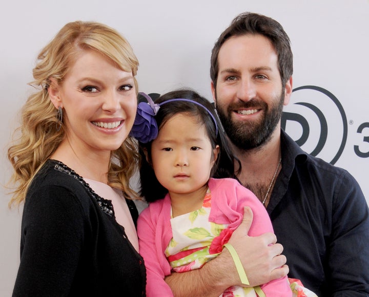 Katherine Heigl and Josh Kelley with their daughter Naleigh in 2014. 