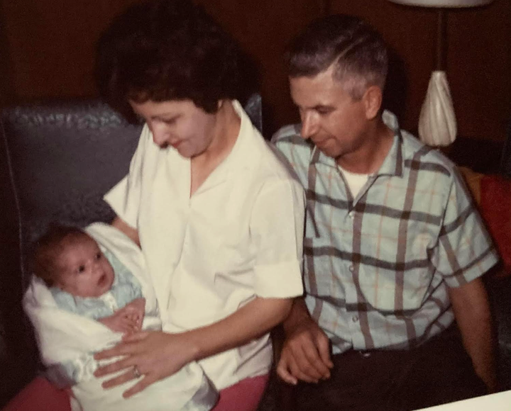 "This is me as a baby with my parents," the author says. "My mom was 36 when she had me, her only child."