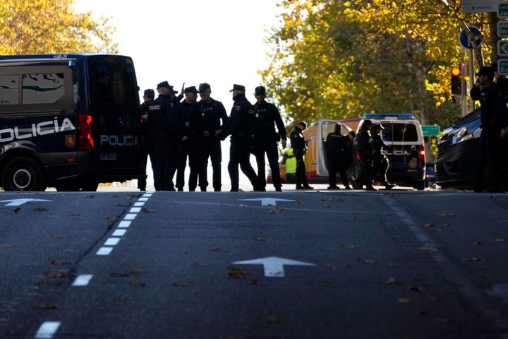 Police officers cordon off the area next to the U.S. embassy in Madrid, Spain, Thursday, Dec. 1, 2022. Spanish officials say a suspicious envelope has been discovered at the U.S. Embassy in Madrid and placed under police control. The finding on Thursday came as police reported a wave of explosive packages being sent in Spain's capital, including one that ignited at the Ukrainian Embassy. (AP Photo/Paul White)