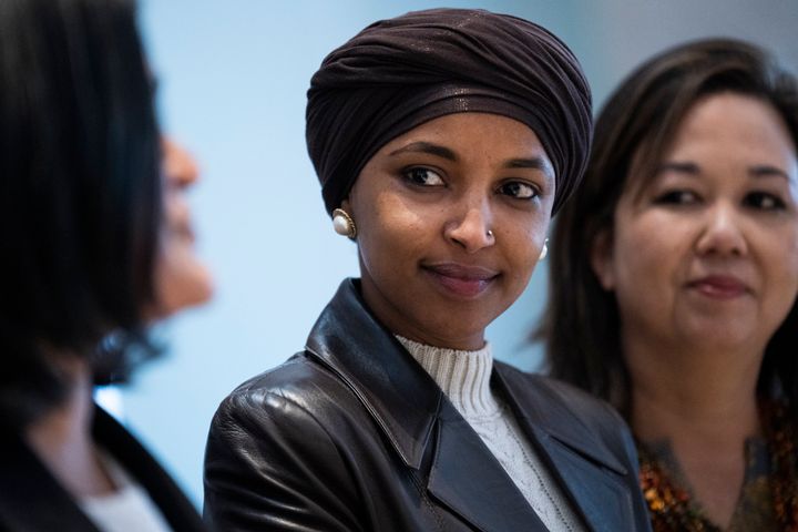 Rep. Ilhan Omar, D-Minn., center, told HuffPost: “I have heard from countless people in my district—particularly immigrants, Muslim-Americans and people have color—who have had bank accounts closed or not been able to bank due to discrimination." Rep.-elect Jill Tokuda, D-Hawaii, right, and Congressional Progressive Caucus Chair Rep. Pramila Jayapal, D-Wash., along with Omar attend a news conference at the AFL-CIO Building in Washington, D.C., on Nov. 13.