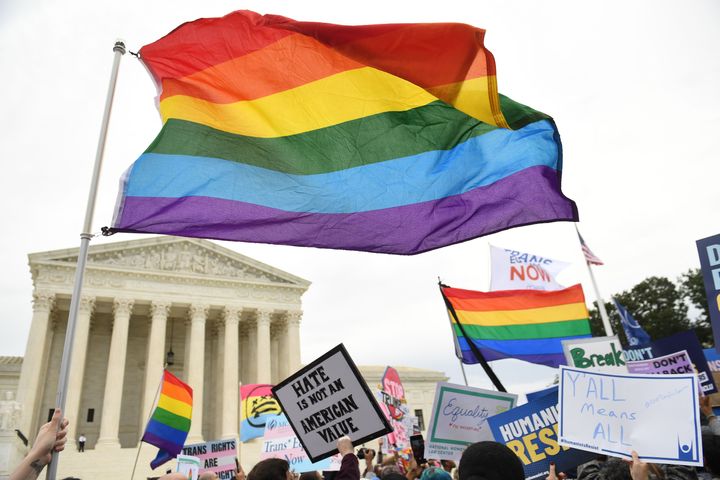 Demonstrators in favor of LGBT rights rally outside the US Supreme Court in Washington, DC, October 8, 2019, as the Court holds oral arguments in three cases dealing with workplace discrimination based on sexual orientation. (Photo by SAUL LOEB / AFP) (Photo by SAUL LOEB/AFP via Getty Images)