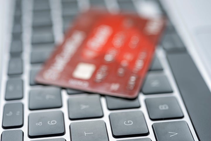 Close up of credit cards on a laptop keyboard