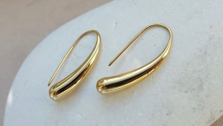 18-karat gold water drop earrings from BriellaJewellery on Etsy