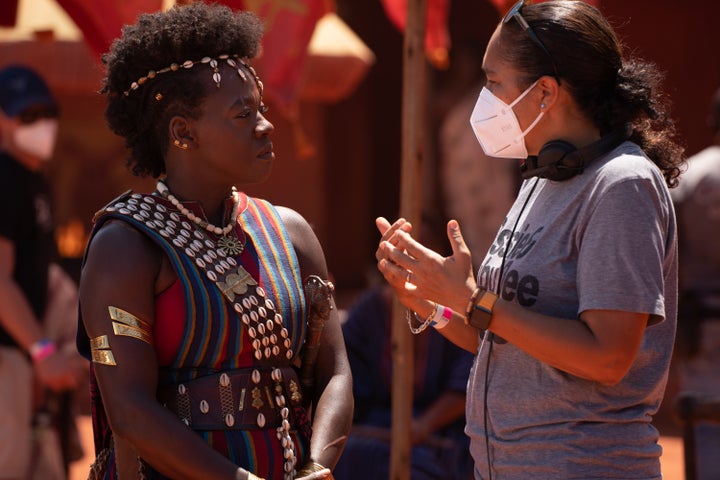 Viola Davis (left) as Nanisca and director Gina Prince-Bythewood on the set of "The Woman King."