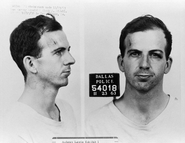Lee Harvey Oswald is seen following his arrest. Conspiracy theorists have questioned Oswald’s past and what the CIA knew about him before Kennedy’s killing.