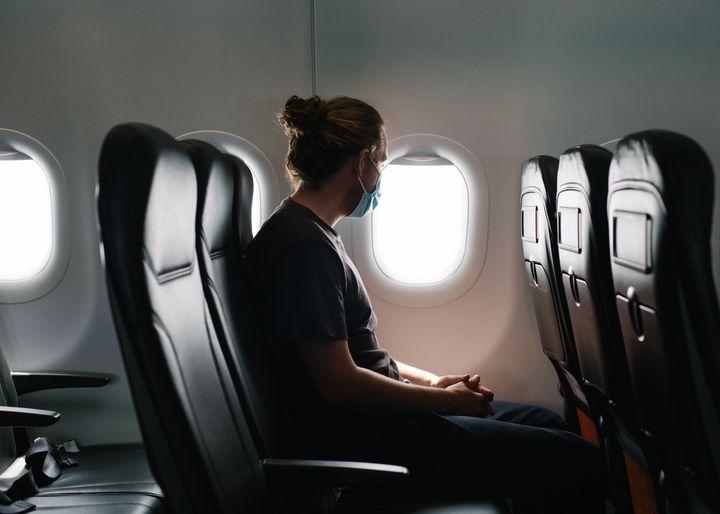 Experts share how to manage your fears or anxiety around flying and the signs it's worth talking to a therapist. 