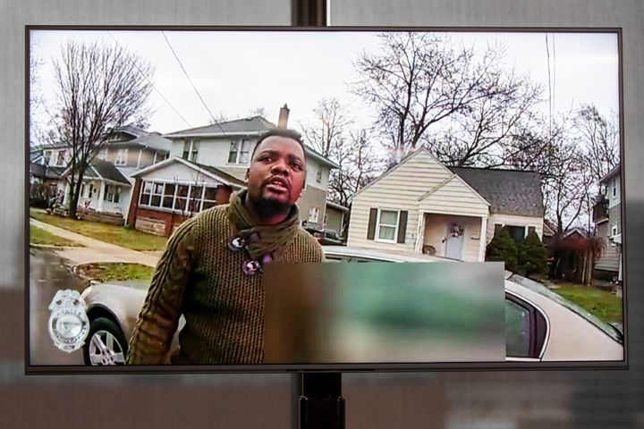 A TV display shows video evidence of a fatal encounter between a police officer and driver Patrick Lyoya in Grand Rapids, Michigan, on April 13.