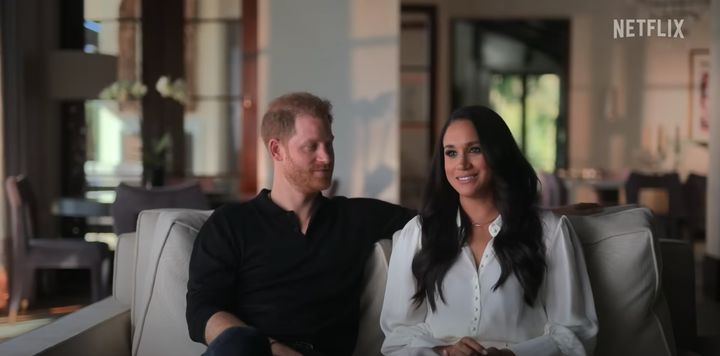 The Duke and Duchess of Sussex pictured speaking in their new documentary, "Harry & Meghan." 