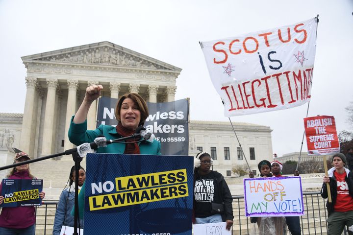 Sen. Amy Klobuchar (D-Minn.) speaks at a rally outside the Supreme Court against the independent state legislature theory on Dec. 7.