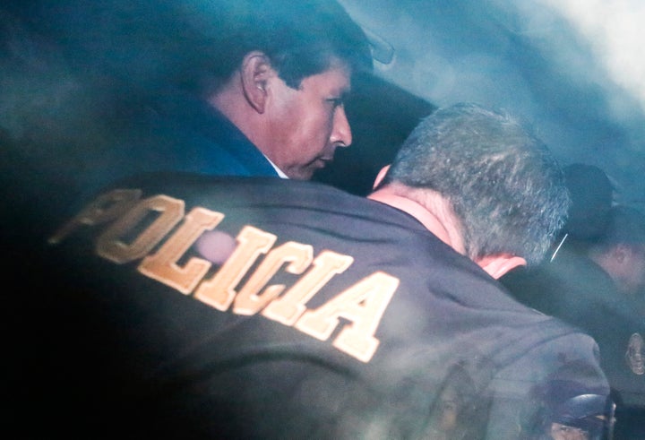 Peru's ousted President Pedro Castillo was escorted by Lima police on Wednesday.