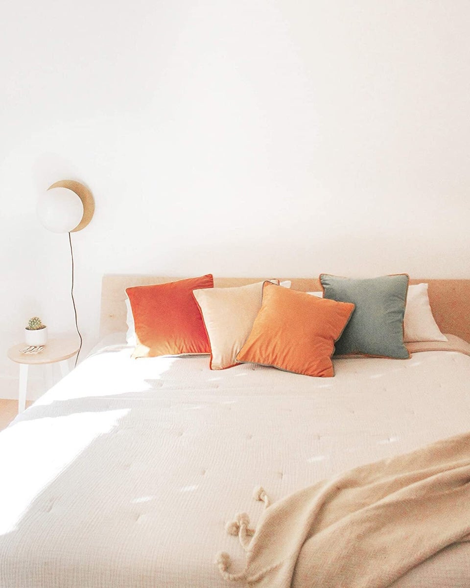 Four coordinating throw pillow covers