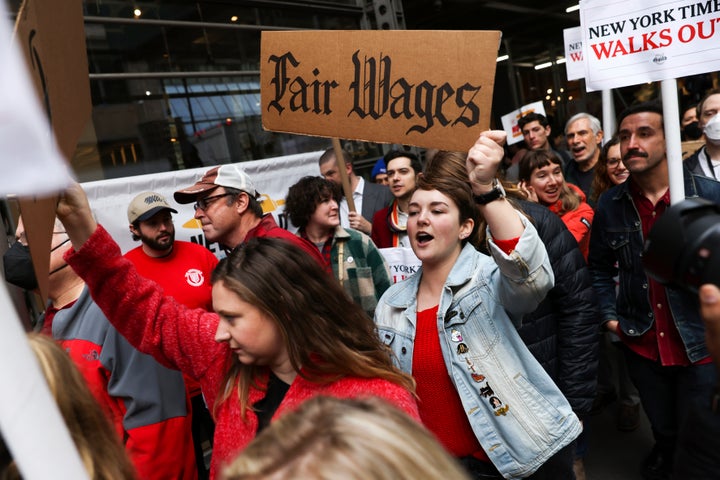 Hundreds of Times staffers picketed the newspaper's Manhattan HQ.