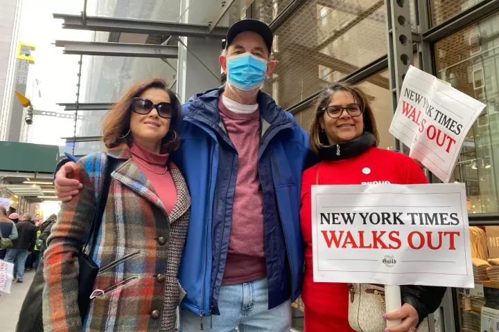 Security workers Karen Letellier, left, John Garafalo and Lila Rivera were among the 1,100 employees of The New York Times who walked off the job for 24 hours, Dec. 8, 2022.