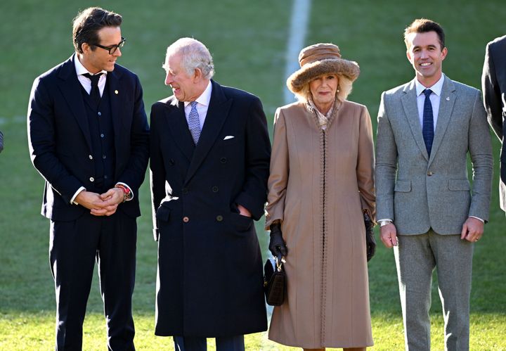 King Charles III and Camilla, Queen Consort meet with co-owners of Wrexham AFC, Ryan Reynolds and Rob McElhenney during their visit