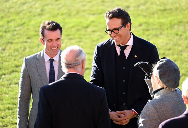 Co-owners of Wrexham AFC Rob McElhenney and Ryan Reynolds welcome King Charles III during their visit