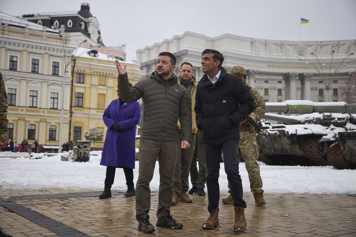 Rishi Sunak, with Volodymyr Zelensky as they look at destroyed Russian military vehicles in Kyiv, Ukraine.