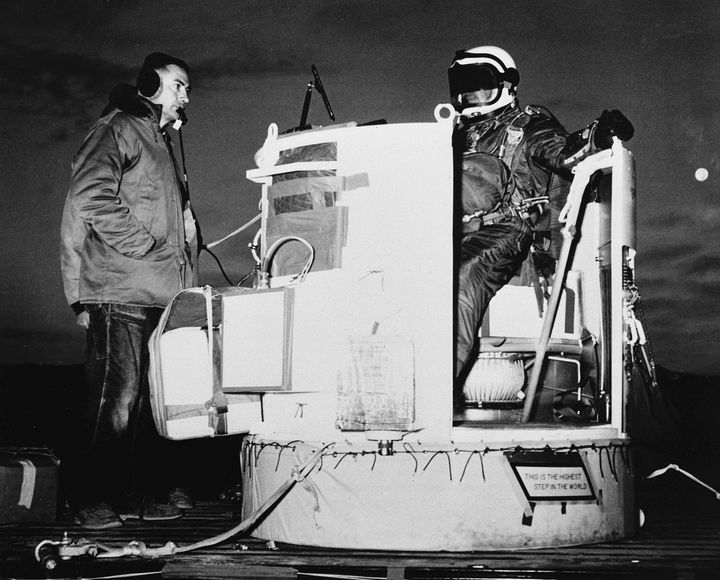 In this photo provided by the U.S. Air Force, Capt. Joseph Kittinger Jr., aerospace laboratory test director, sits in the open balloon gondola after his first parachute test jump for Project Excelsior at the Air Force Missile Development Center, N.M., Nov. 16, 1959. 