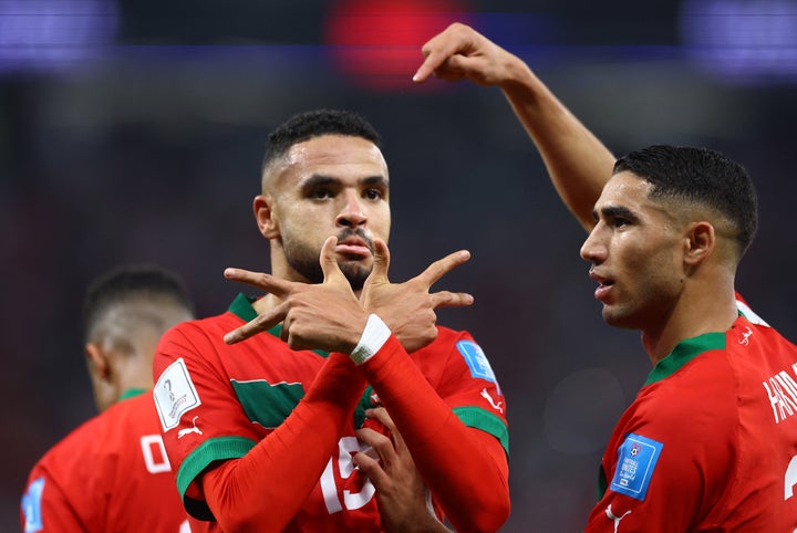 Soccer Football - FIFA World Cup Qatar 2022 - Quarter Final - Morocco v Portugal - Al Thumama Stadium, Doha, Qatar - December 10, 2022 Morocco's Youssef En-Nesyri celebrates scoring their first goal REUTERS/Carl Recine