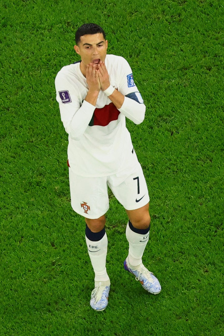 Soccer Football - FIFA World Cup Qatar 2022 - Quarter Final - Morocco v Portugal - Al Thumama Stadium, Doha, Qatar - December 10, 2022 Portugal's Cristiano Ronaldo reacts REUTERS/Fabrizio Bensch